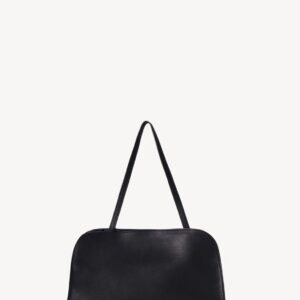 The Row Peggy Clutch in Leather black