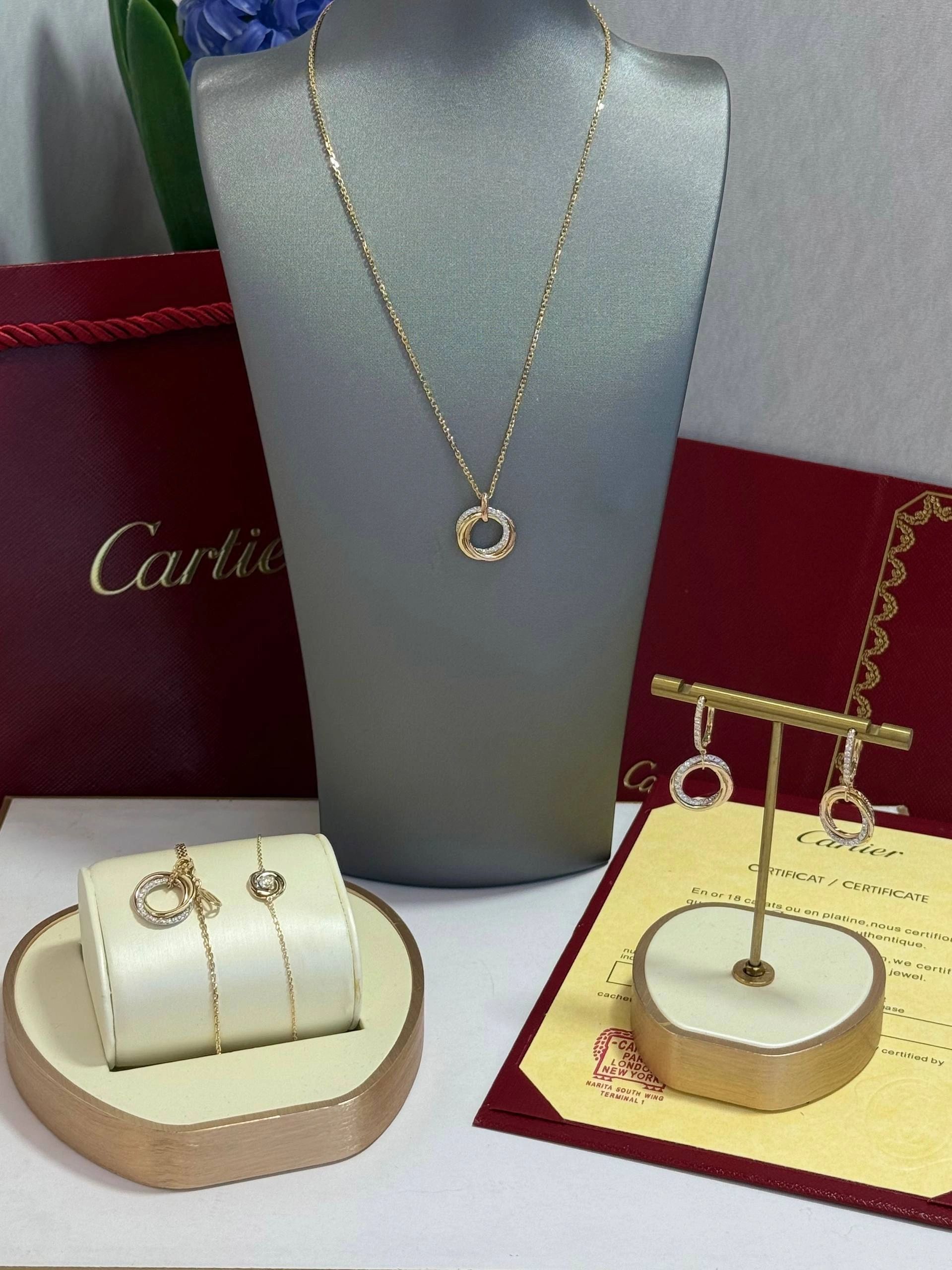 Cartier Trinity Hoop Dangle Earrings are crafted from 18K tricolor gold with diamonds - Image 5