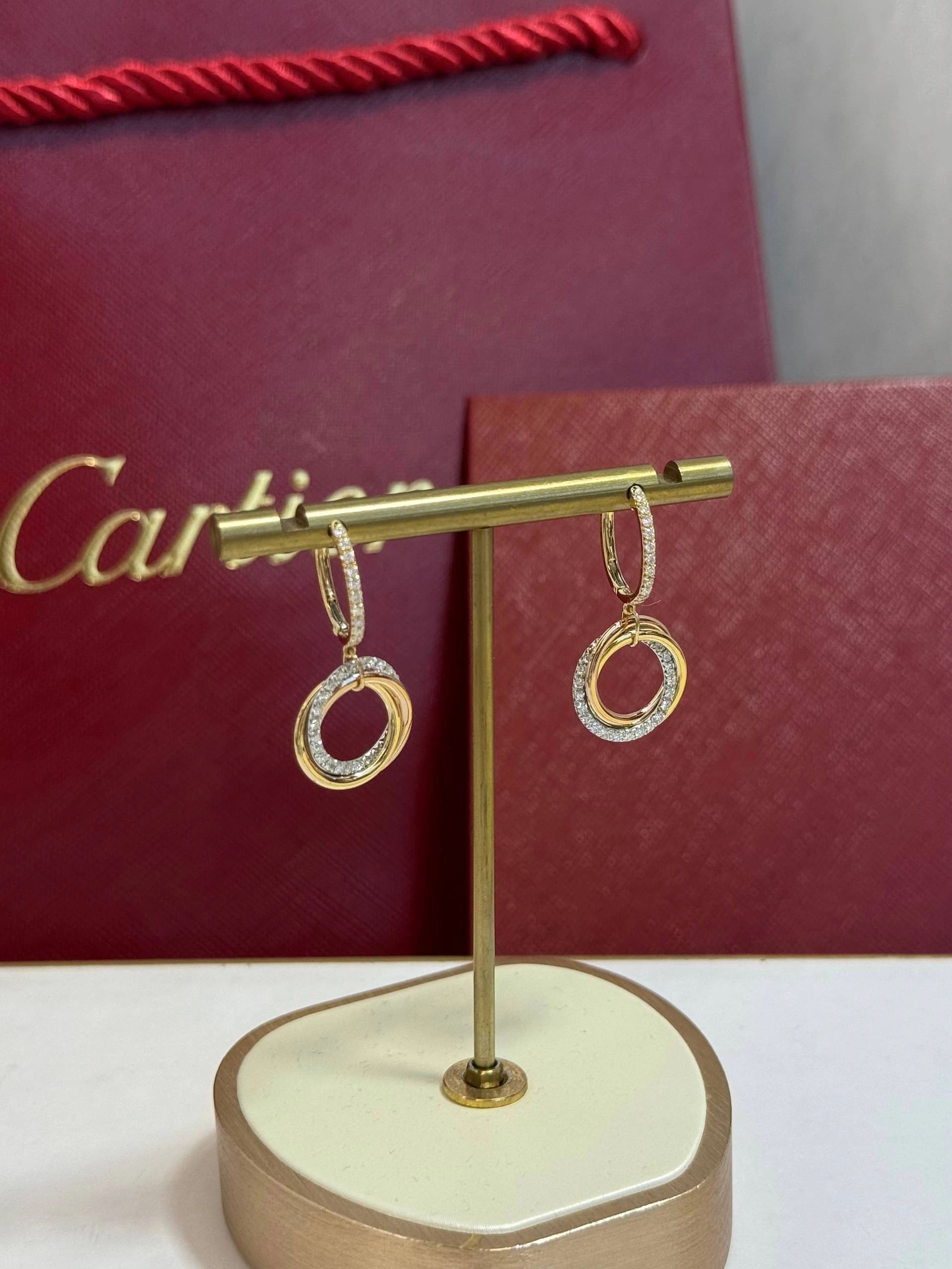 Cartier Trinity Hoop Dangle Earrings are crafted from 18K tricolor gold with diamonds - Image 4