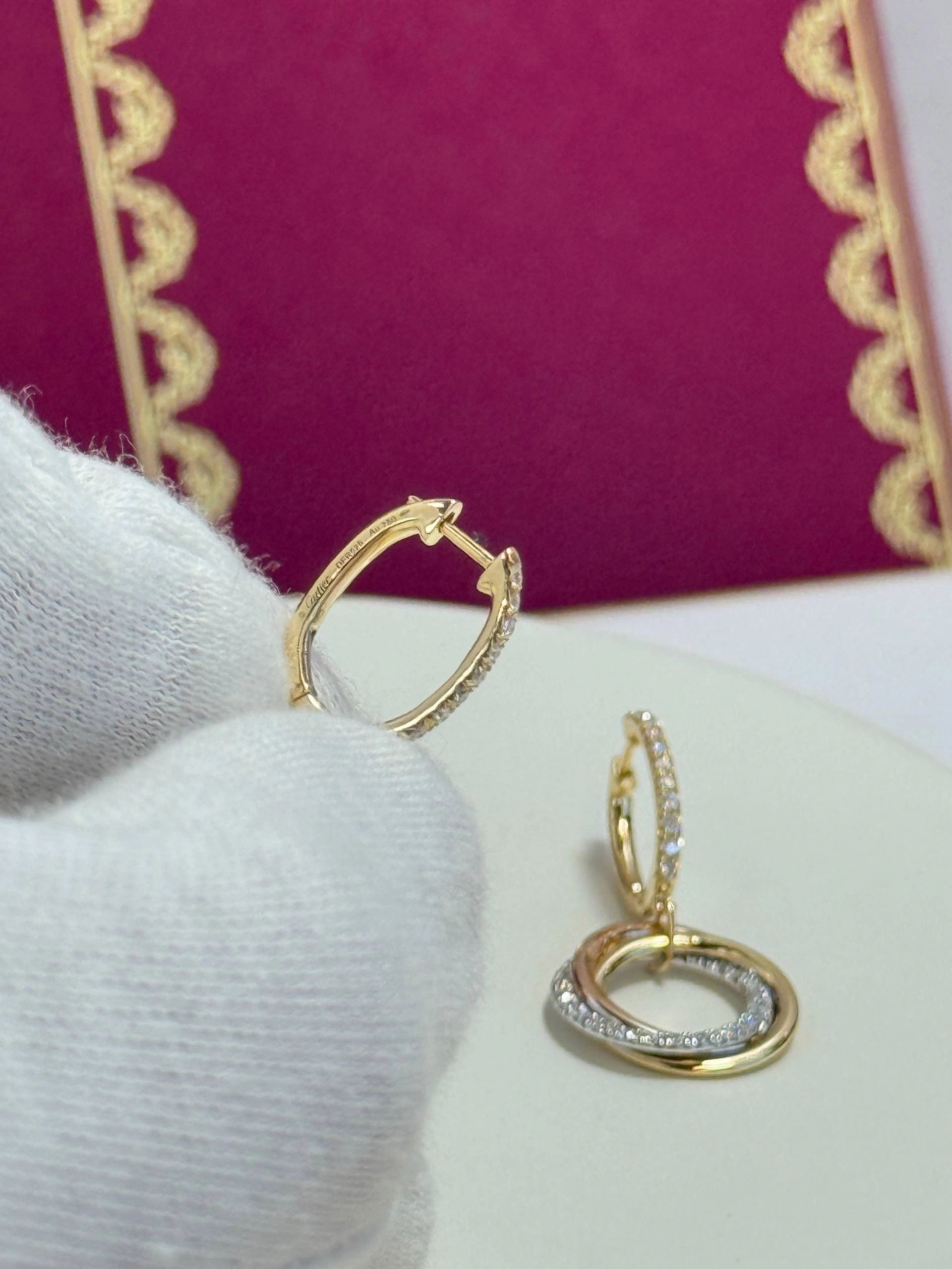 Cartier Trinity Hoop Dangle Earrings are crafted from 18K tricolor gold with diamonds - Image 2