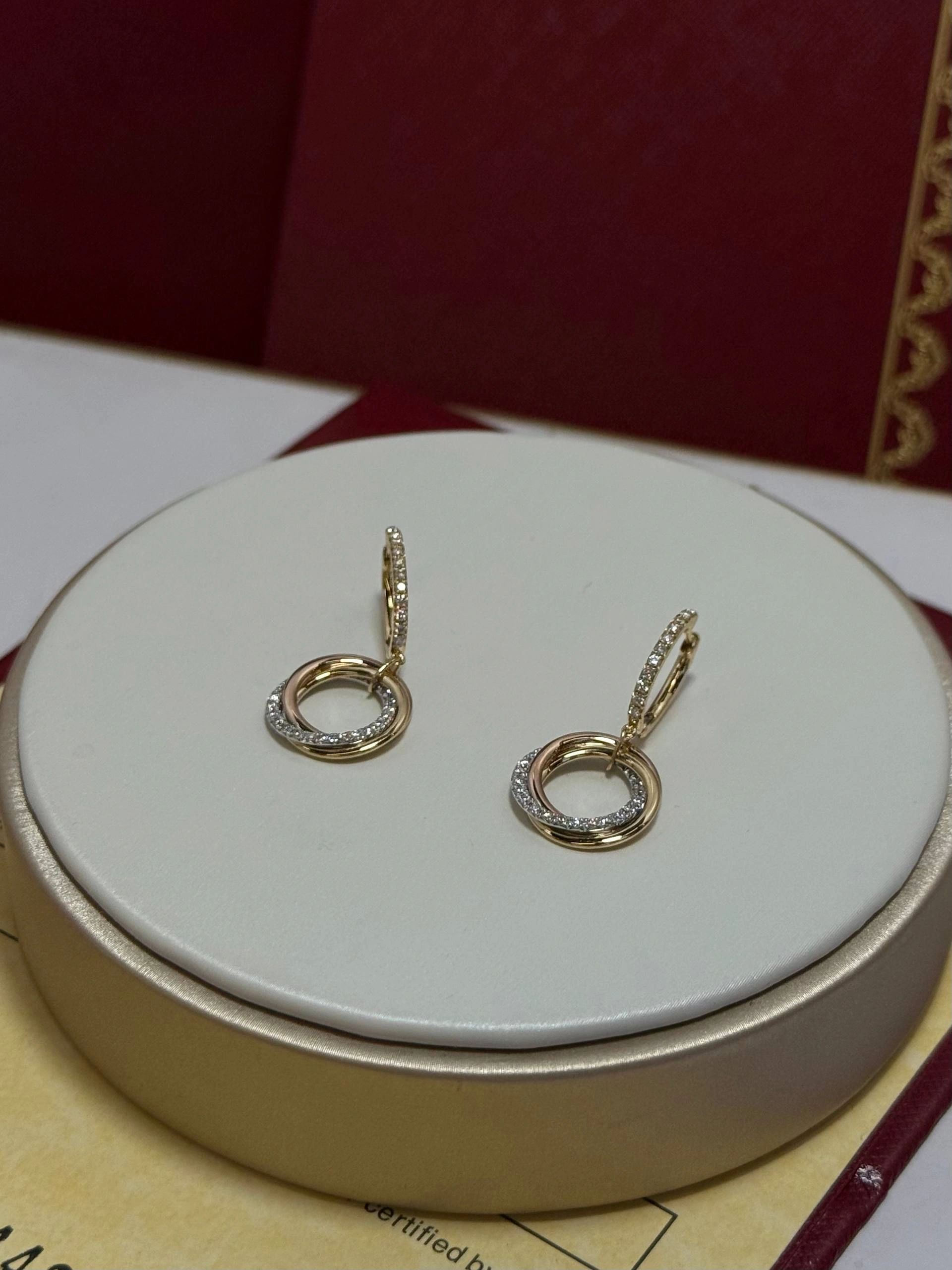 Cartier Trinity Hoop Dangle Earrings are crafted from 18K tricolor gold with diamonds - Image 3